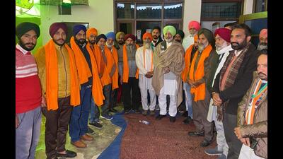 Three SAD families being inducted into the Congress in Mohali on Sunday. (HT Photo)