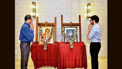 Maharashtra Chief Minister Uddhav Thackeray with his son and State Environment Minister Aaditya Thackeray pays homage to the Shiv Sena founder Bal Thackeray and Netaji Subhas Chandra Bose on their birth anniversaries, at their residence, in Mumbai on Sunday. (ANI) Maharashtra Chief Minister Uddhav Thackeray with his son and State Environment Minister Aaditya Thackeray pays homage to the Shiv Sena founder Bal Thackeray and Netaji Subhas Chandra Bose on their birth anniversaries, at their residence, in Mumbai on Sunday. (ANI)