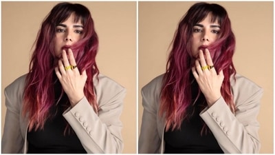 Styled by fashion stylist Radhika Mehra, Kirti left her coloured tresses open in wavy curls with fringes. (Instagram/@iamkirtikulhari)