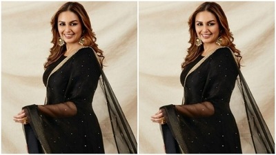 Huma wore a black salwar suit for the photoshoot – the salwar came with minimal details in gold beads. She paired it with a silk black dupatta decorated in golden zari. (Instagram/@iamhumaq)