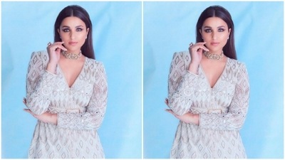 With a stunning silver choker and a statement white ring, Parineeti completed her look for the day. (Instagram/@parineetichopra)