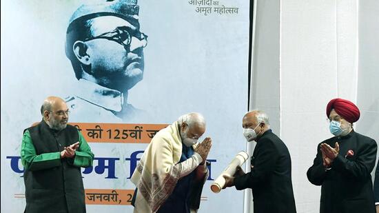 Prime Minister Narendra Modi conferring the Subhas Chandra Bose Aapda Prabadhan Puraskar in New Delhi on Sunday. (ANI)