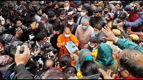 Ghaziabad, India - January 23, 2022: Uttar Pradesh Chief Minister Yogi Adityanath during his door- to door camping at Rajiv Colony, Sahibabad, in Ghaziabad, India, on Sunday, January 23 , 2022. (Photo by Sakib Ali /Hindustan Times)