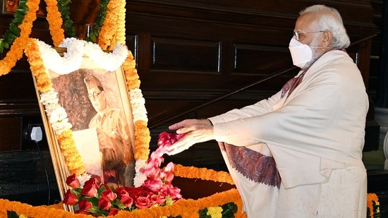 Prime Minister Narendra Modi pays floral tribute to the portrait of Netaji Subhas Chandra Bose on his 125th birth anniversary, at the Central Hall of Parliament, in New Delhi. (ANI Photo) Prime Minister Narendra Modi pays floral tribute to the portrait of Netaji Subhas Chandra Bose on his 125th birth anniversary, at the Central Hall of Parliament, in New Delhi. (ANI Photo)