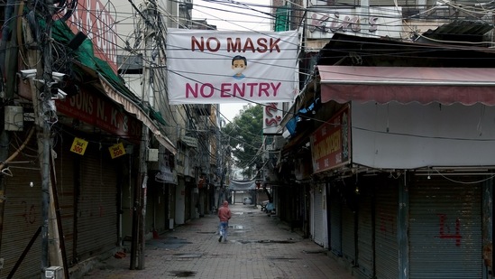 A deserted view of Lajpat Nagar market as the city observes weekend curfew, in view of rising Covid-19 cases in New Delhi on Sunday.&nbsp;(ANI)