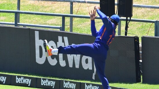 India's Virat Kohli takes a catch on the boundary to dismiss South Africa's David Miller during the third one-day international (ODI) cricket match between South Africa and India at Newlands Stadium in Cape Town on January 23, 2022.&nbsp;