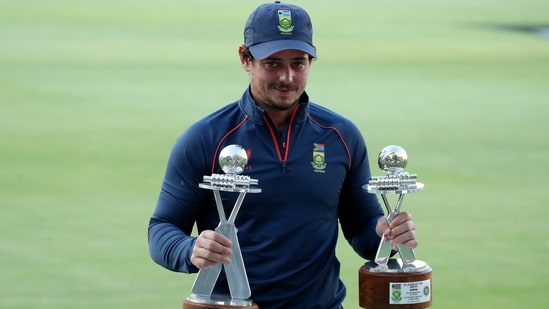 South Africa's Quinton de Kock poses with the player of the match and player of the series trophies&nbsp;(REUTERS)