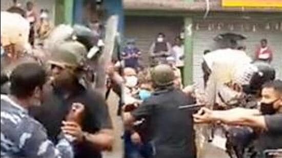 Video footage captured by local television channels showed one of Arjun Singh’s security personnel loading a pistol and pointing it at some people who confronted the MP, but police said the allegations of firing were being probed but there was no evidence of any clash or ransacking. (SCREENGRAB.)