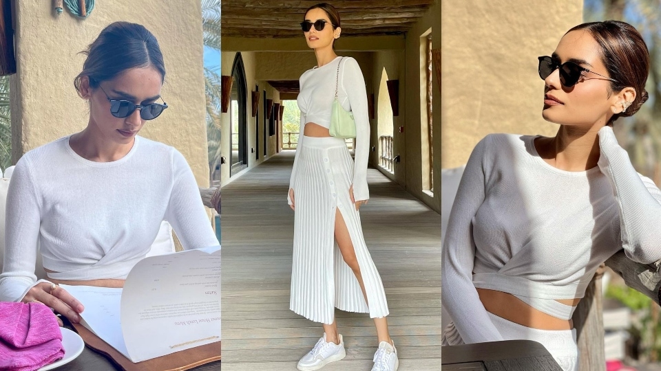 Manushi Chhillar pairs the all-white look with minimal accessories.&nbsp;