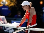 Simona Halep of Romania rests on the net following her fourth round loss to Alize Cornet of France at the Australian Open Simona Halep of Romania rests on the net following her fourth round loss to Alize Cornet of France at the Australian Open