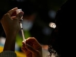 WHO’s regional director for Europe Hans Kluge said he is concerned about the number of unvaccinated people across the globe who are “helping to drive transmission.” In picture - A Pharmacist fills a syringe with Covid-19 vaccine. WHO’s regional director for Europe Hans Kluge said he is concerned about the number of unvaccinated people across the globe who are “helping to drive transmission.” In picture - A Pharmacist fills a syringe with Covid-19 vaccine.