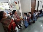 Pre-primary students attending the first day of school after its reopening in Dadar, Mumbai, on Monday.(Anshuman Poyrekar/HT Photo) Pre-primary students attending the first day of school after its reopening in Dadar, Mumbai, on Monday.(Anshuman Poyrekar/HT Photo)