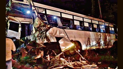 The mangled remained of the bus carrying the wedding party near Doraha in Ludhiana, hours after a speeding truck rammed into it. (HT Photo)