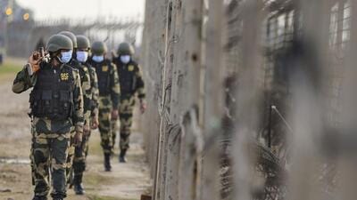Border Security Force personnel patrol at international border ahead of the Republic Day, in Jammu on Monday. (PTI) Border Security Force personnel patrol at international border ahead of the Republic Day, in Jammu on Monday. (PTI)