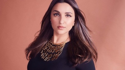 Taking to her social media handle, Parineeti shared a slew of pictures that featured her putting her sartorial foot forward in a round neck black crop top that came with churidaar sleeves and flaunted a killer waistline. (Instagram/parineetichopra) Taking to her social media handle, Parineeti shared a slew of pictures that featured her putting her sartorial foot forward in a round neck black crop top that came with churidaar sleeves and flaunted a killer waistline. (Instagram/parineetichopra)