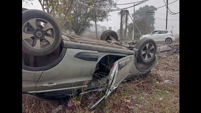 The ill-fated car in which the victim was travelling in, near Focal Point area in Ludhiana on Monday. (HT Photo)