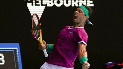 Rafael Nadal of Spain celebrates a point win over Adrian Mannarino of France during their fourth round match at the Australian Open tennis championships in Melbourne, Australia, Sunday, Jan. 23, 2022.&nbsp; (AP)