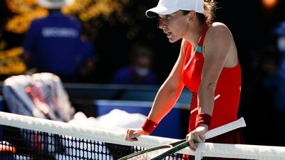 Simona Halep of Romania rests on the net following her fourth round loss to Alize Cornet of France at the Australian Open (AP) Simona Halep of Romania rests on the net following her fourth round loss to Alize Cornet of France at the Australian Open (AP)