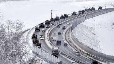 A convoy of Russian armoured vehicles moves along a highway in Crimea, on January 18, 2022. (AP) A convoy of Russian armoured vehicles moves along a highway in Crimea, on January 18, 2022. (AP)
