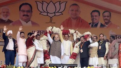 Union home minister Amit Shah with UP deputy chief minister Keshav Prasad Maurya being garlanded by BJP leaders at a public rally ahead of the ahead of the elections, in Moradabad in December. (ANI) Union home minister Amit Shah with UP deputy chief minister Keshav Prasad Maurya being garlanded by BJP leaders at a public rally ahead of the ahead of the elections, in Moradabad in December. (ANI)