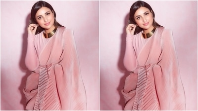 Parineeti teamed the elegant number with a full-sleeved blouse in a matching shade featuring a bodycon fit with a round neckline. (Instagram/@parineetichopra) Parineeti teamed the elegant number with a full-sleeved blouse in a matching shade featuring a bodycon fit with a round neckline. (Instagram/@parineetichopra)