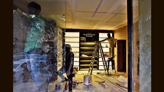 A liquor store undergoing renovation in November last year, At 21, the number of dry days in the Capital was among the highest across states and Union territories. A reduction in the number was a long-standing demand. (HT Photo)