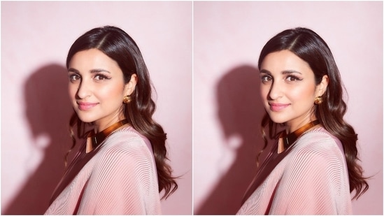 Parineeti channelled her inner retro queen wearing a contemporary blush pink saree. She captioned the post, "Cast me in a retro movie?" The six yards the actor wore in the photoshoot is from the shelves of the clothing label, Faabiiana. Additionally, celebrity stylist Tanya Ghavri, who has worked with stars like Kareena Kapoor Khan, Sara Ali Khan, Janhvi Kapoor and more, styled the star's look.(Instagram/@parineetichopra)