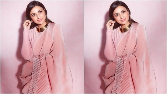 Parineeti teamed the elegant number with a full-sleeved blouse in a matching shade featuring a bodycon fit with a round neckline.(Instagram/@parineetichopra)