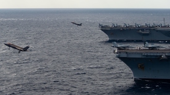 Fifth generation F-35s take off from USS Carl Vinson and Abraham Lincoln in the Philippines Sea to send a deterrence message to aggressive China. Fifth generation F-35s take off from USS Carl Vinson and Abraham Lincoln in the Philippines Sea to send a deterrence message to aggressive China.