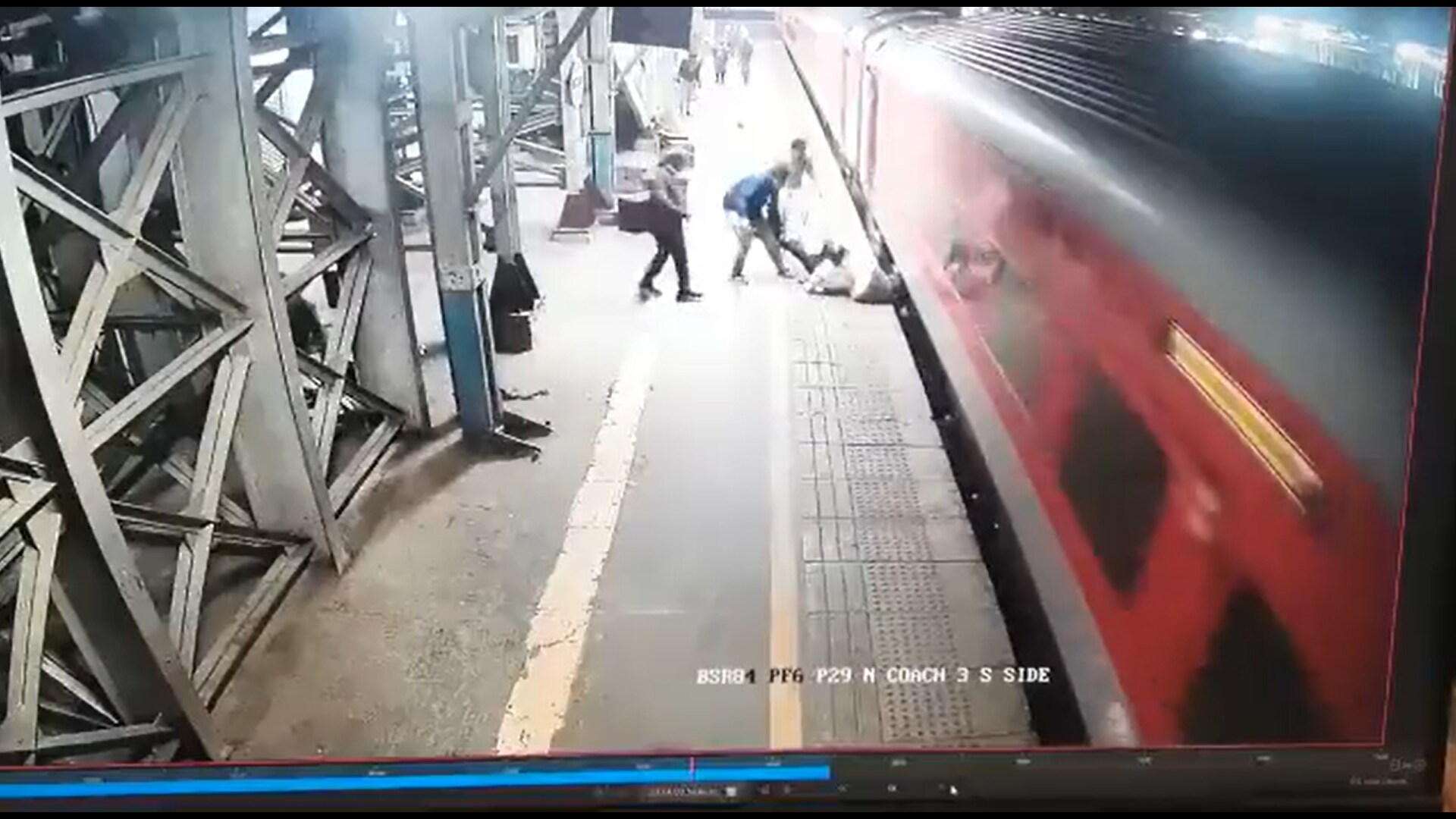 RPF personnel save the man, who fell on the platform while attempting to board the moving train at the Vasai Railway Station in Maharashtra. (Screengrab/ANI) RPF personnel save the man, who fell on the platform while attempting to board the moving train at the Vasai Railway Station in Maharashtra. (Screengrab/ANI)