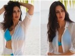 Katrina Kaif cannot get over her Maldives honeymoon pictures and her Instagram handle says it all. In her recent photos, the actor poses in a blue and white bikini with the pristine beach in the backdrop.(Instagram/@katrinakaif)