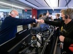 Nasa James Webb Space Telescope Project Manager Bill Ochs, left and others from the operations team celebrate after confirming that the observatory's final primary mirror wing successfully extended and locked into place.