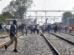 Aspirants block railway tracks during their protest over alleged erroneous results of Railway Recruitment Board's Non-Technical Popular Categories (RRB NTPC) exam 2021, in Prayagraj, Tuesday, Jan. 25, 2022.&nbsp;