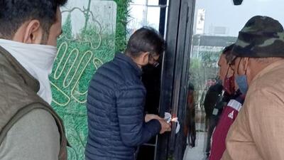 Officials of the HSVP sealed three buildings comprising shops and offices in the upscale Sector 29 market, in Gurugram on Monday. (Sourced)