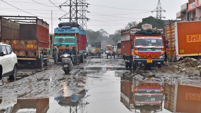 Transporters in Ludhiana criticised public representatives for their indifferent attitude toward the deplorable state of transport nagar, raising issues of potholed roads, waterlogging and security concerns. (Gurpreet Singh?HT) Transporters in Ludhiana criticised public representatives for their indifferent attitude toward the deplorable state of transport nagar, raising issues of potholed roads, waterlogging and security concerns. (Gurpreet Singh?HT)