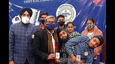 Conjoined twins Sohna and Mohna Singh with their voter cards in Chandigarh. Conjoined twins Sohna and Mohna Singh with their voter cards in Chandigarh.