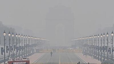 A view of the barely visible India Gate due to dense fog at Rajpath in New Delhi on Monday. (ANI) A view of the barely visible India Gate due to dense fog at Rajpath in New Delhi on Monday. (ANI)