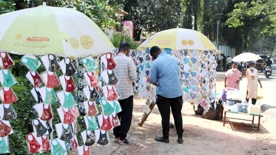 A street vendor sells masks in Thiruvananthapuram. (ANI Photo) A street vendor sells masks in Thiruvananthapuram. (ANI Photo)