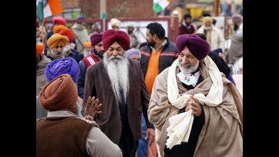 Mohali MLA Balbir Singh Sidhu addressing campaigning in Mohali on Tuesday ahead of the Punjab assembly elections. (HT Photo)