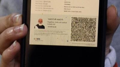 A person shows a soft copy of the Covid-19 vaccine certificate in New Delhi. (Hindustan Times/ File) A person shows a soft copy of the Covid-19 vaccine certificate in New Delhi. (Hindustan Times/ File)