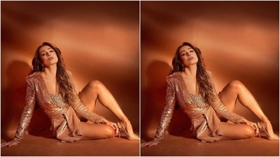 In the end, centre-parted tresses styled in soft waves, blood-red nail paint, berry-toned lip shade, winged eyeliner, mascara-adorned lashes, shimmery eye shadow, glowing skin, blushed cheeks and sharp contouring rounded up the glam picks. What do you think of Malaika's look? (Instagram/@manekaharisinghani) In the end, centre-parted tresses styled in soft waves, blood-red nail paint, berry-toned lip shade, winged eyeliner, mascara-adorned lashes, shimmery eye shadow, glowing skin, blushed cheeks and sharp contouring rounded up the glam picks. What do you think of Malaika's look? (Instagram/@manekaharisinghani)