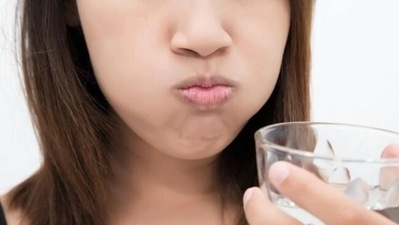 1. Oil pulling: Swishing oil in the mouth is called oil pulling. The practice helps in the removal of microbes from the gums and teeth. It helps in alleviating mouth ulcers. It also exercises the muscles of the mouth, thereby strengthening and toning them. (Instagram)