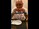 The image, taken from the Instagram video, shows the Italian man eating samosa.(Instagram/@indian_italian_couple)