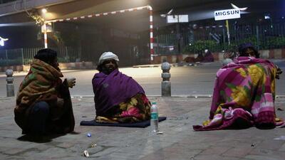 People on a cold winter evening in New Delhi. (ANI)