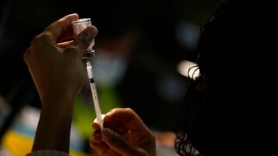 According to current rates, each dose of the Bharat Biotech-produced Covaxin is priced at ₹1,200, while Serum Institute’s Covishield costs ₹780 in private facilities. (Representational image) (AP) According to current rates, each dose of the Bharat Biotech-produced Covaxin is priced at ₹1,200, while Serum Institute’s Covishield costs ₹780 in private facilities. (Representational image) (AP)