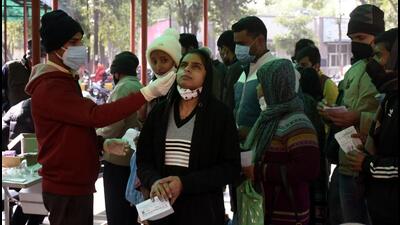 A health worker collects swab samples for Covid-19 test at the Combined District Hospital in Sanjay Nagar, Ghaziabad, on Wednesday. (Sakib Ali /HT)