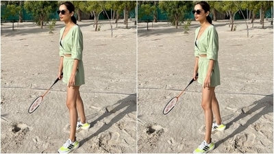 Manushi's outfit for the day included a monotone blouse and shorts set in a sage green shade. The former Miss World looked absolutely glam in the ensemble. Her blouse comes in a cropped length with a plunging V neckline, ribbed hem, and gathered quarter-length sleeves. She wore it over a white spaghetti-strapped tank top. (Instagram/@manushi_chhillar)
