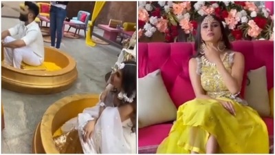 Mouni Roy with Suraj Nambiar during their haldi ceremony. Mouni Roy with Suraj Nambiar during their haldi ceremony.