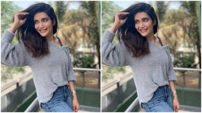In open tresses with a side part, Karishma posed as she looked away from the camera. (Instagram/@karishmaktanna)