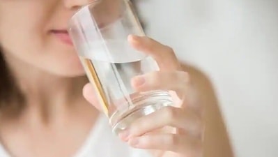 Drink warm water to promote digestive function. Honey helps you soothe your throat. (Shutterstock)